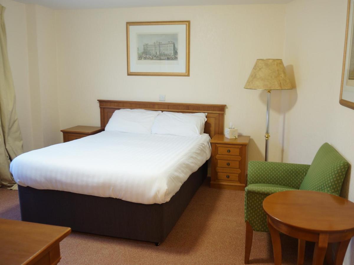 The Corner House Hotel Annan Bagian luar foto