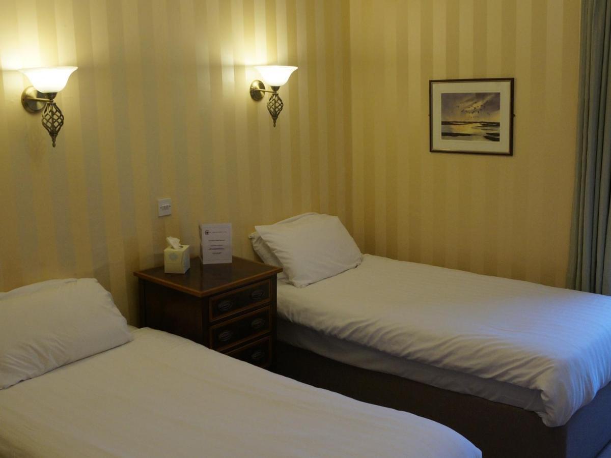 The Corner House Hotel Annan Bagian luar foto