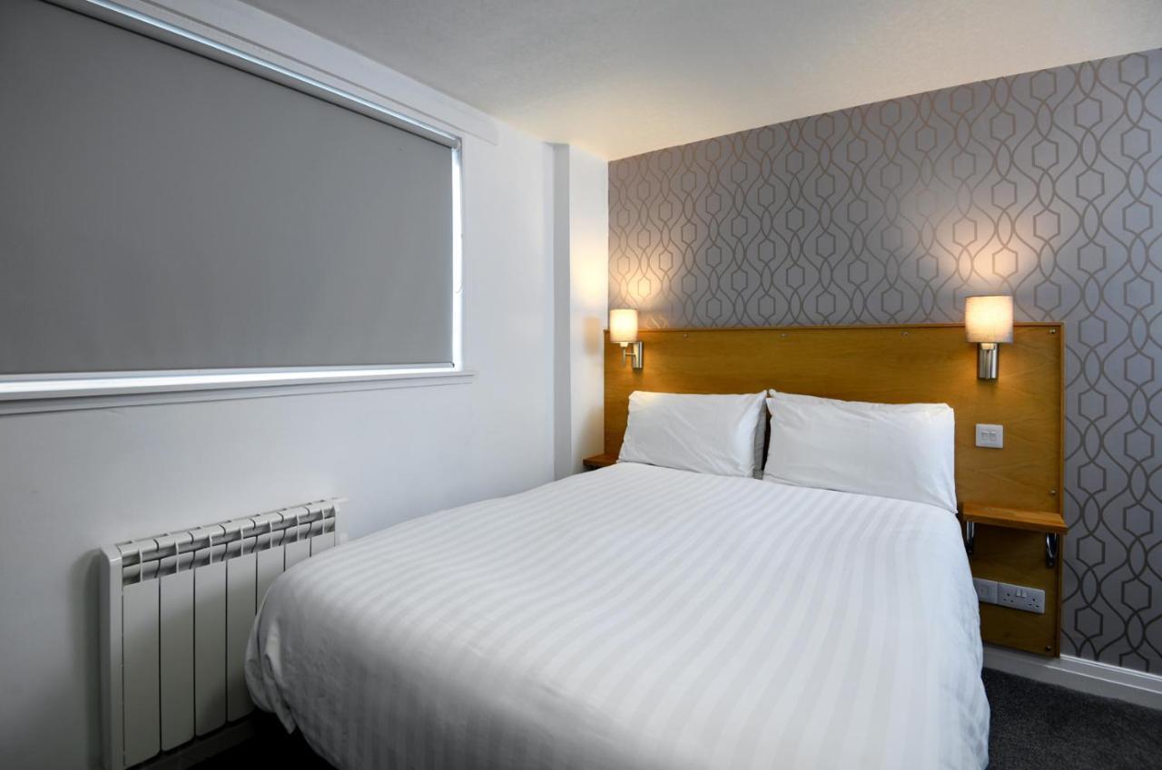 The Corner House Hotel Annan Bagian luar foto